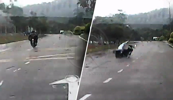 Motosikal kemalangan akibat baju hujan tersangkut di tayar